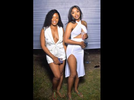 Double the elegance: Anna (left) and Niqui shone brightly in their white outfits at El Rancho in Dunbeholden, St Catherine, on April 30.