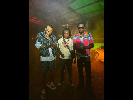 From left: Tommy Lee Sparta, Dinesty King and Ding Dong in a scene from the video for ‘Guzu Bounce’.