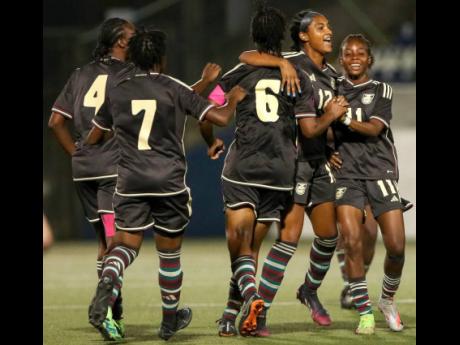 Jamaica’s Under-20 Reggae Girlz’ Shaneil Buckley (right) celebrates with teammates after scoring during an earlier qualifying match against Bermuda at the Concacaf Women’s Under-20 Championship at the Nacional Stadium, in Managua, Nicaragua.