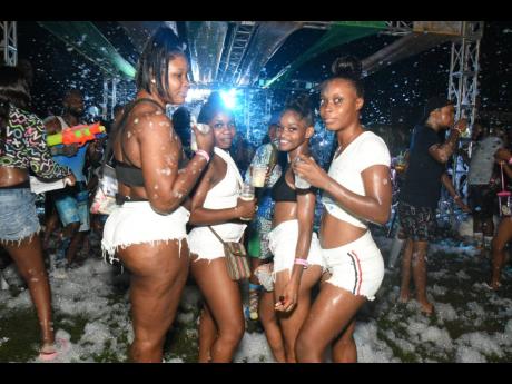 Patrons enjoying the vibe at Jungle Jouvert, held at Pier One in Montego Bay, St James, last Saturday.