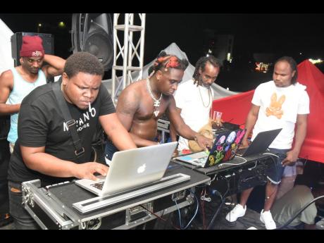 Krazy Dawg and Polo Blacks Movement DJs delivering during their set.