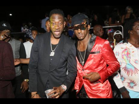 Credit: Nathaniel Stewart Man of the moment Bounty Killer (left) with veteran dancer Shelly Belly.