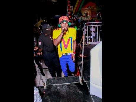 Magnum Top Performa competitor, Kurry Stain, enters the stage to give his performance at the roadshow last Friday in Linstead, St Catherine.