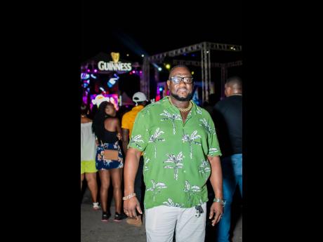 Credit: Contributed Kevin Brown, Red Stripe’s security manager, looked fashionably fly in his earth-toned fit.