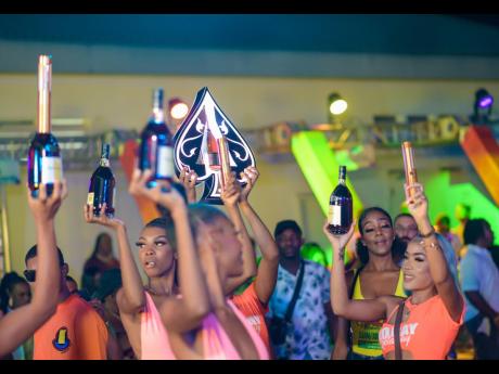 Bottle service girls being kept busy throughout the night.