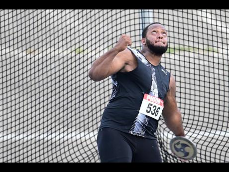Reckless Control’s Traves Smikle is about to throw the men’s discus to 66.12 metres for victory at the National Senior and Junior Championships at the National Stadium on Saturday.