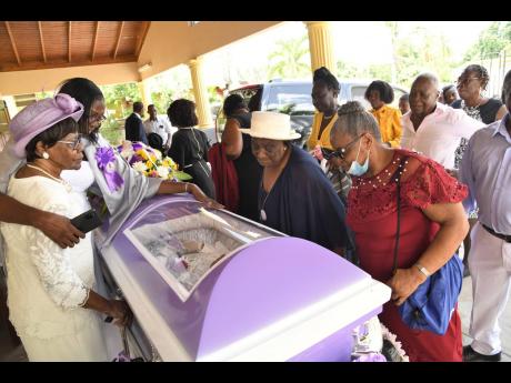 Mourners pay their final respects to Richards, who they described as a true woman of God.
