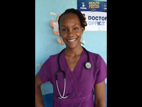 Dr Yanique Montaque-Williams, volunteer at the Jamaica Energy Partner (JEP) annual health, dental and wellness fair held at Old Harbour Bay Primary School last Friday.