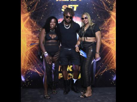 Credit: Ashley Anguin Anthony Allen is flanked by Yolanda Cole (left) and Simone Coleman.