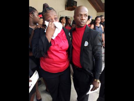 Romone’s mother, Camilla Williams (left), and his stepfather, Kevin Williams.
