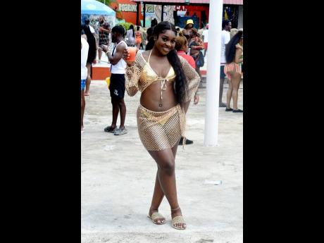 Golden girl Keisha Aboagye stopped for a quick pic at Dream WKND’s Wet N Wild at Kool Runnings Water Park in Negril on Sunday.