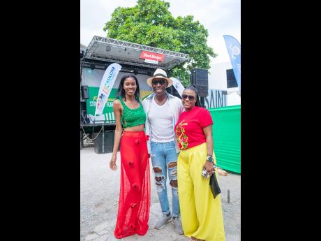(From left) Designer Kadian Nicely; Founder of Saint International Models Deiwght Peters; and Red Stripe Flavours Brand Manager Jodi-Ann Campbell share lens space.