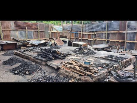 Credit: File Houses destroyed by fire in Gregory Park, St Catherine, recently.