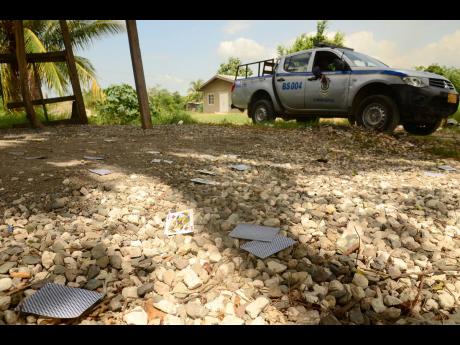File photo shows a scene where four persons were killed in Seaview Gardens back in 2013.
