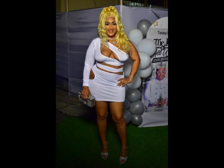 This eye-catching beauty adds a touch of brilliance to Tommy ‘Brite Lite’ Thompson’s 55th birthday extravaganza, aptly named the ‘King of All-White’ affair. The event, hosted at Sabina Park in Kingston, exudes an atmosphere of pure sophistication and celebration.