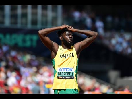 Rasheed Broadbell is shocked after crashing out of the men’s 110 metres hurdles.