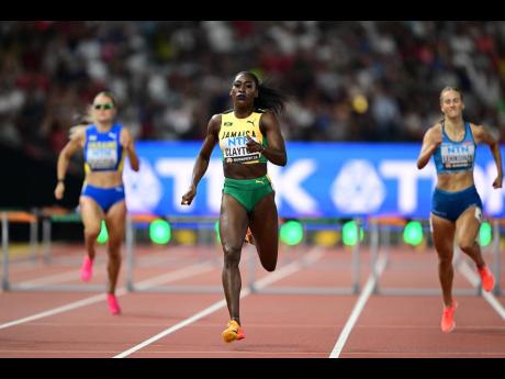 Gladstone Taylor/Multimedia Photo Editor
Jamaica’s Rushell Clayton wins heat one of the women’s 400m hurdles semi-finals in a personal best 53.30 seconds at the World  Athletics Championships in Budapest, Hungary yesterday.
