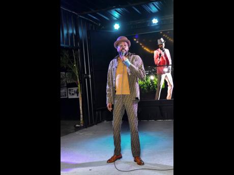 Photo by Anthony Minott 
Beenie Man raps with the audience at the launch of his 17th album ‘Simma’ at Di Lot, on Constant Spring Road, St Andrew, on Monday.