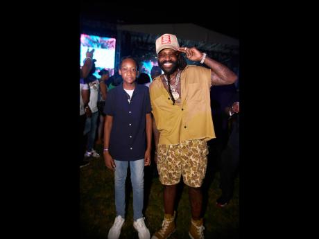 Tarrus Riley (right), shares the experience with son, Mekiem. 