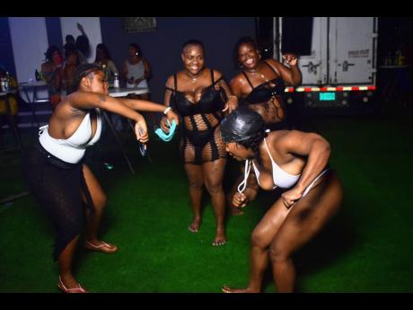 Patrons having a great time at Wet Fantasy Water Party.