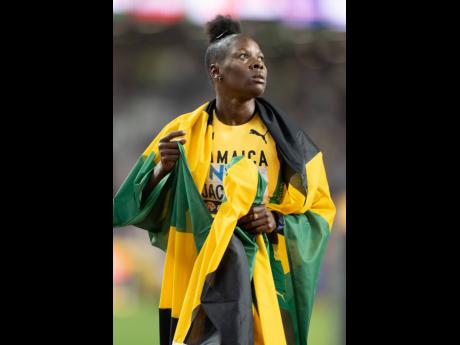 Jamaica’s Shericka Jackson watches the stadium screen intently after anchoring Jamaica to the silver medal behind the United States of America  in the women’s 4x100 metres relay at the recent World Championships in Budapest, Hungary.