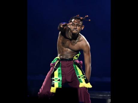 Don Soup performing at Chris Brown and friends concert, part of the Under the Influence Tour, held at the National Stadium in St Andrew on August 27. 