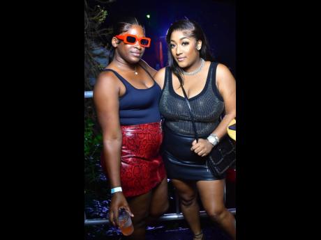 Sharing this photo op are Shan Beauty (left) and Keiva.