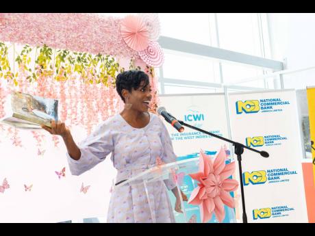 Stacey Hines, breast cancer survivor and CEO Epic Transformations, is animated during her presentation at the official launch of the ICWI/Jamaica Reach to Recovery Pink Run, which was held on Tuesday at the Toyota Jamaica showroom on Old Hope Road in Kingston. 
