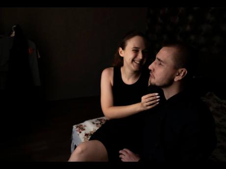 Blind Ukrainian soldier Ivan Soroka and his wife Vladislava Ryabets.