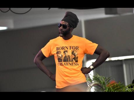 Buju Banton on stage at the PNP’s 85th anniversary conference at the National Arena on Sunday.