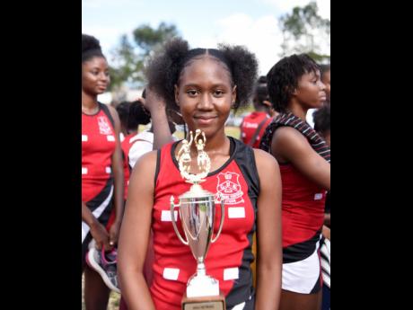 Glenmuir’s captain Brianna Nevers poses with the trophy after winning the All-Island Under-19 netball competition last year. Glenmuir will be one of the teams participating in the Rural Area Under-19 rally at Manchester High, which starts the season today.
