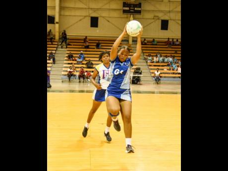 Credit: File St. Catherine High’s Kayla Wright (right) collects a pass ahead of Gaynstead High’s Christal Nicholson during the Urban Senior netball final held at the National Indoor Sports Centre in December. St Catherine won 26-23 to win the title. They start the defence tomorrow.