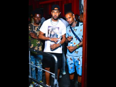 Credit: Anthony Minott Man of the moment Cham (centre) hangs with Black Man (left) and Wilfulskilful.