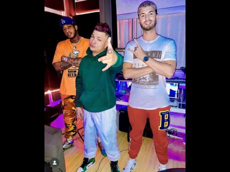 Dancehall artiste Popeye Caution (left) hangs with reggaeton star Jowell (centre) and Latin artiste and producer Felva.