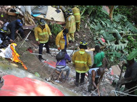 Residents of Bowden Hill help firefighters to dig through the carnage.