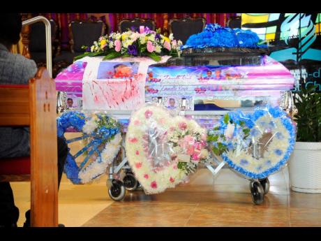 The casket holding the body of Danielle Rowe at the youngster’s funeral in July.