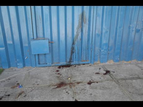 Bloodstains show the carnage that took place at the Genesis Lounge & Grill in Summerfield, Clarendon, where four men were shot and killed early Wednesday morning.