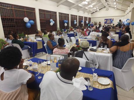 Scores of persons turned out to celebrate with Sybil Robinson as she turned 100.
