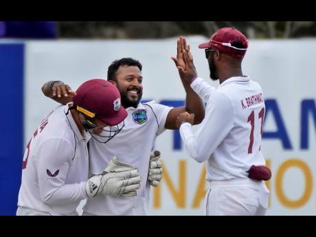  Veerasammy Permaul (centre)