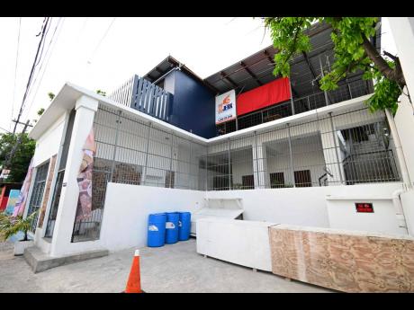 Credit: Gladstone Taylor Gladstone Taylor/Multimedia Photo editor
The development at the intersection of Charles Street and Rum Lane in central Kingston that already houses a 22 Jerk outlet, as well as an ice cream and water store.