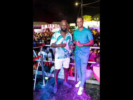 Credit: Contributed Good vibe all around! Allure promoter Dwayne Dacres (left) and Smirnoff Assistant Brand Manager Ben Sinclair caught up at the Smirnoff Cabana.