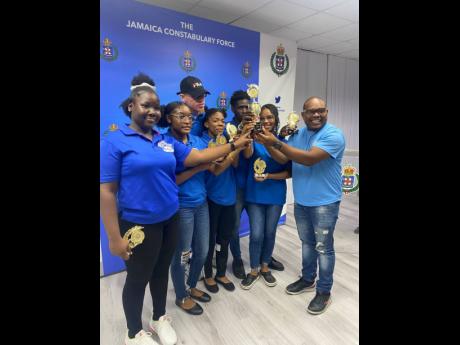 Credit: Contributed Members of the Hayes PYC who recently won the National PYC Quiz celebrate their victory.