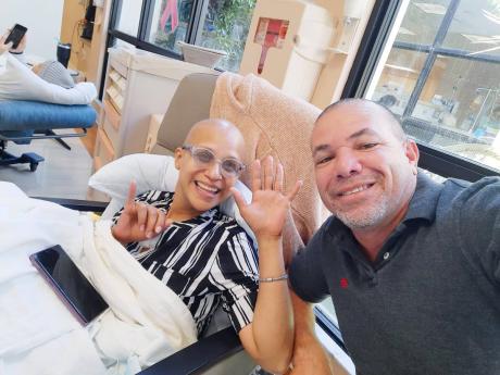 Credit: Contributed Lesley-Ann Touzalin-Thomson and husband Steven Thomson.