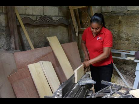 Sherrika Reid operates S.M.L. Essentials, a Harbour View-based furnitute making company, with her father and two brothers.