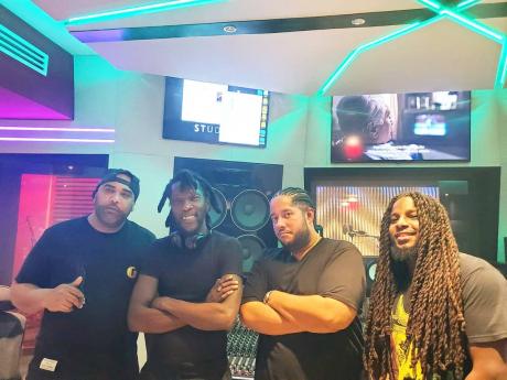 Vas Productions’ Richardo Vasconcellos (left) chills with producers (from second left) Marlon Asher, Don Corleonie and Major Seven.