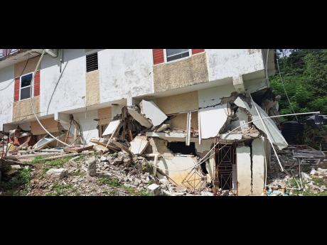 A section of the three-storey house which was damaged during the earthquake at Content in Hope Bay, Portland on Monday.
