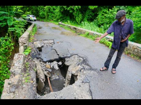 Credit: File A section of the Llandewey main road was closed on June 19 to facilitate the replacement of this severely defective box culvert bridge. The work should have lasted three months, but after five months the structure is not close to being completed.