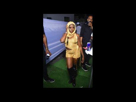 Shanique Mertimore, appearing to be fresh from Dubai, strikes a pose at Sexy Suggie’s ‘Reveal party, held recently in the Corporate Area.