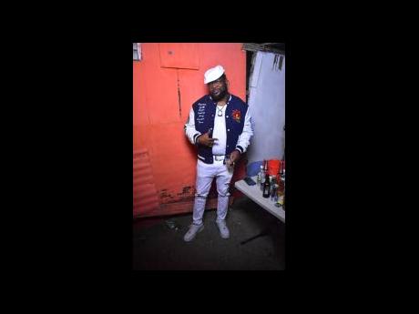 Veteran artiste Harry Toddler shows his support for DJ Tom at his birthday celebration.