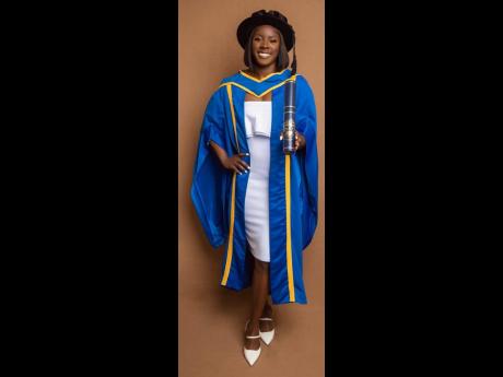 Credit: Courtesy of www.instagram.com/sherickajacko Dr Shericka Jackson is all smiles after being conferred with an honorary Doctor of Laws degree from the University of Technology (UTech) on Saturday.